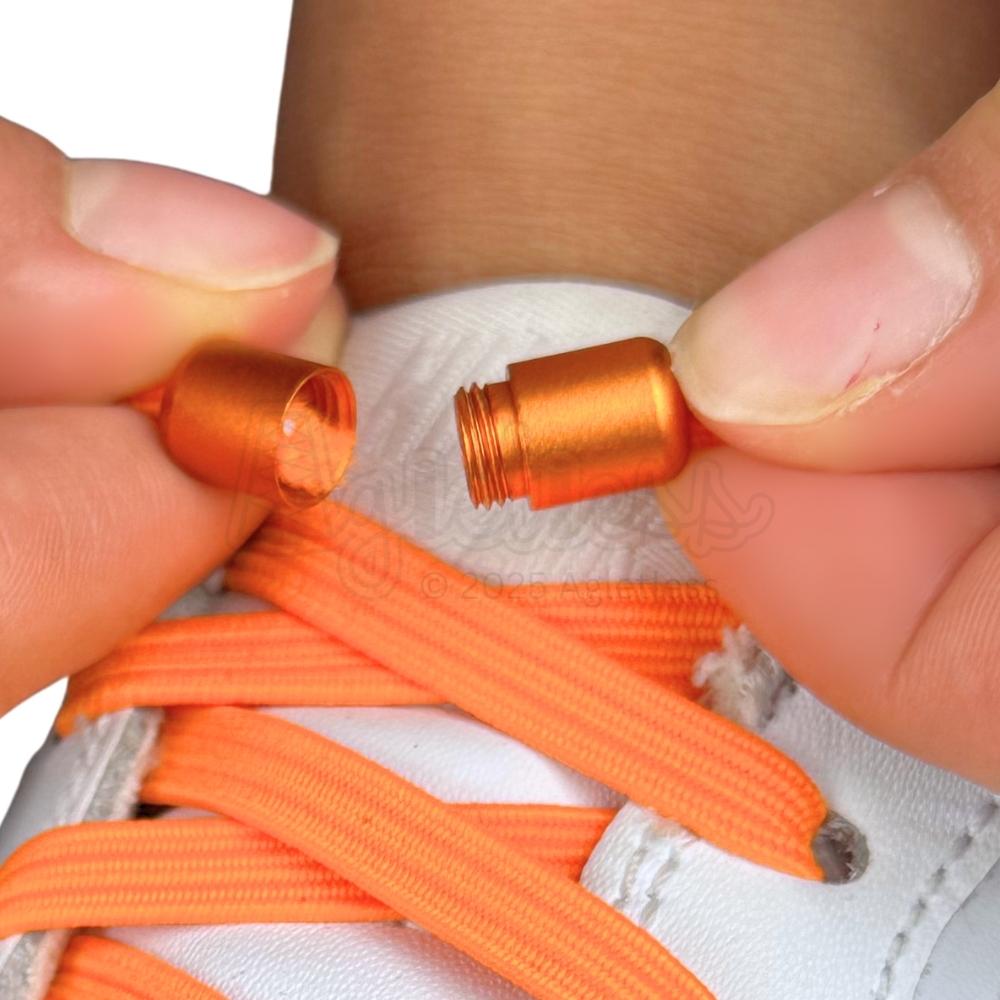 Elastische veters zonder strikken plat 7mm capsule sluiting oranje detailfoto van hoe de sluiting werkt