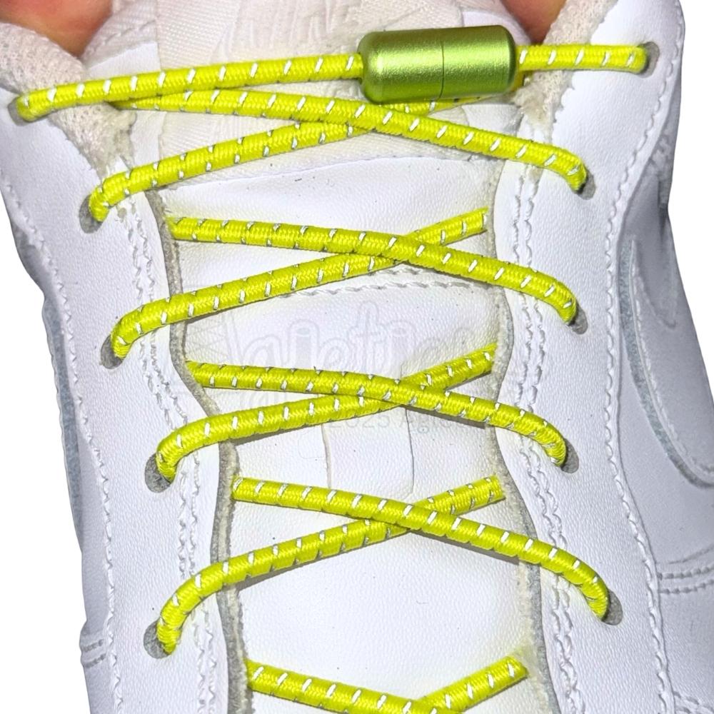 Elastische veters zonder strikken reflecterend 3mm capsule sluiting citroengeel met stretch uitgerekt