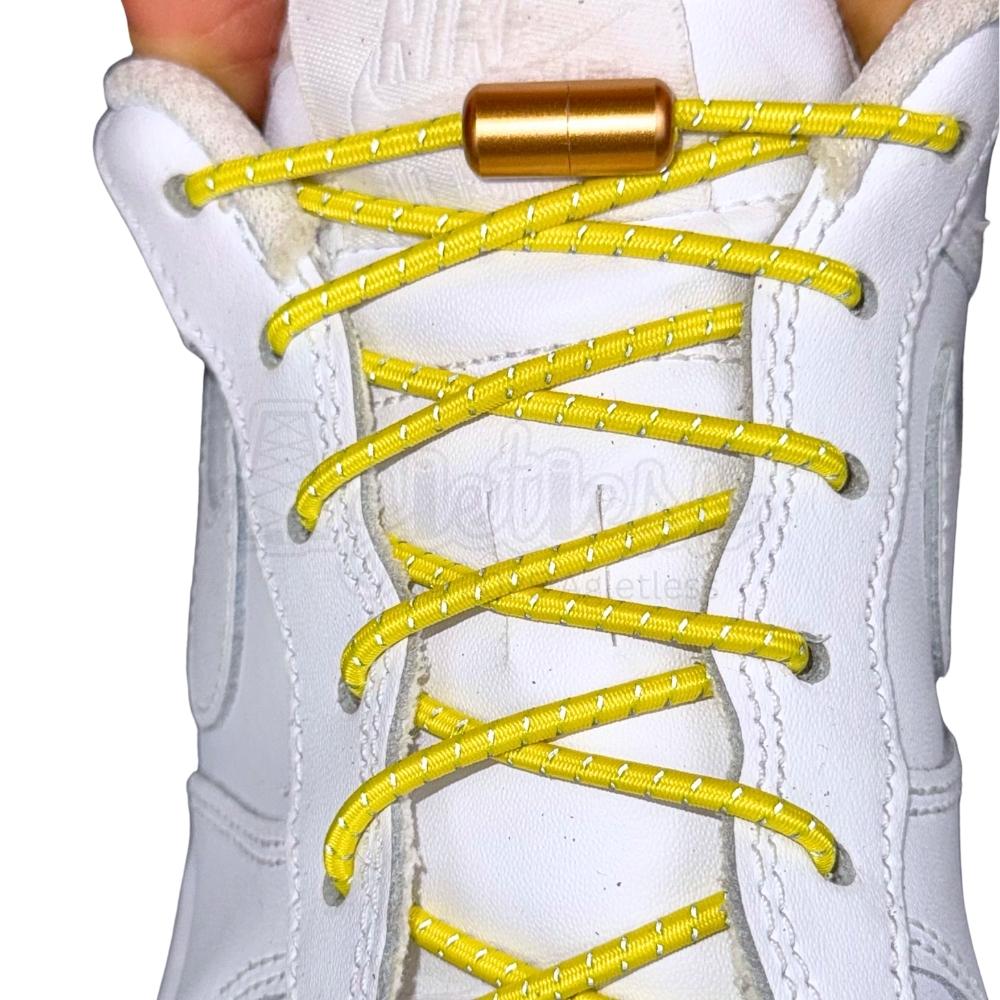 Elastische veters zonder strikken reflecterend 3mm capsule sluiting geel met stretch uitgerekt