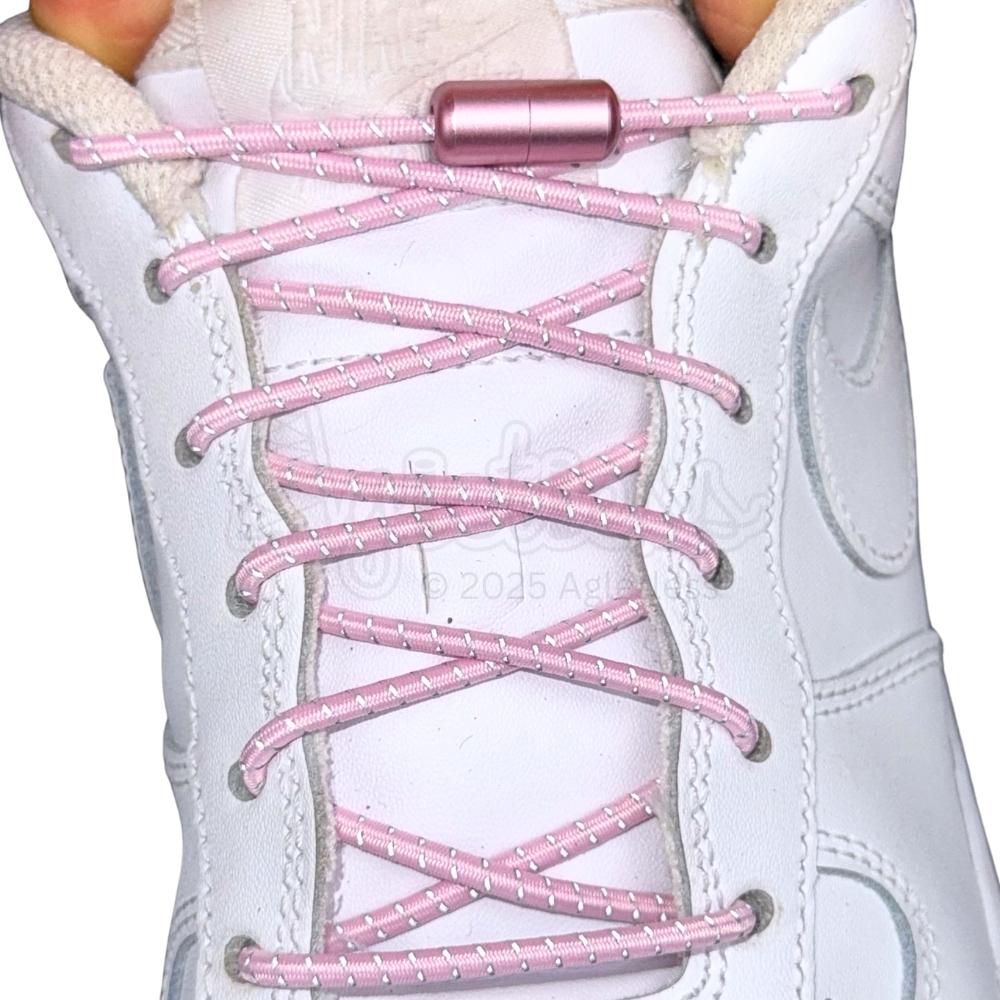 Elastische veters zonder strikken reflecterend 3mm capsule sluiting roze met stretch uitgerekt