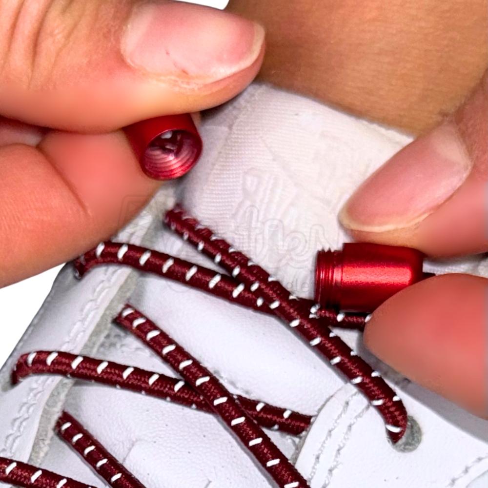 Elastische veters zonder strikken reflecterend 3mm capsule sluiting wijnrood detailfoto van hoe de sluiting werkt