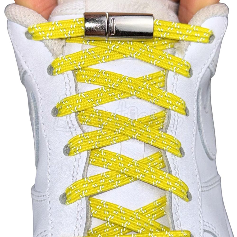 Elastische veters zonder strikken reflecterend 7mm magnetische sluiting geel met stretch uitgerekt
