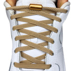 Elastische veters zonder strikken plat 6mm metalen draai capsule khaki met stretch uitgerekt