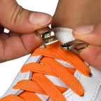 Elastische veters zonder strikken plat 9mm magnetische sluiting oranje detailfoto van hoe de sluiting werkt