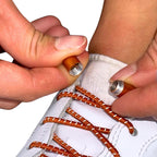 Elastische veters zonder strikken reflecterend 3mm capsule sluiting bronze detailfoto van hoe de sluiting werkt