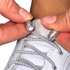 Elastische veters zonder strikken reflecterend 3mm capsule sluiting grijs detailfoto van hoe de sluiting werkt