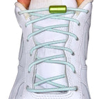 Elastische veters zonder strikken reflecterend 3mm capsule sluiting lichtgroen met stretch uitgerekt