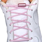 Elastische veters zonder strikken reflecterend 3mm capsule sluiting roze met stretch uitgerekt