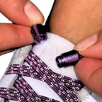 Elastische veters zonder strikken reflecterend 7mm capsule sluiting paars detailfoto van hoe de sluiting werkt