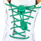 Elastische veters zonder strikken rond 3mm lock sluiting groen met stretch uitgerekt