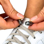 Elastische veters zonder strikken rond 5mm capsule sluiting grijs detailfoto van hoe de sluiting werkt